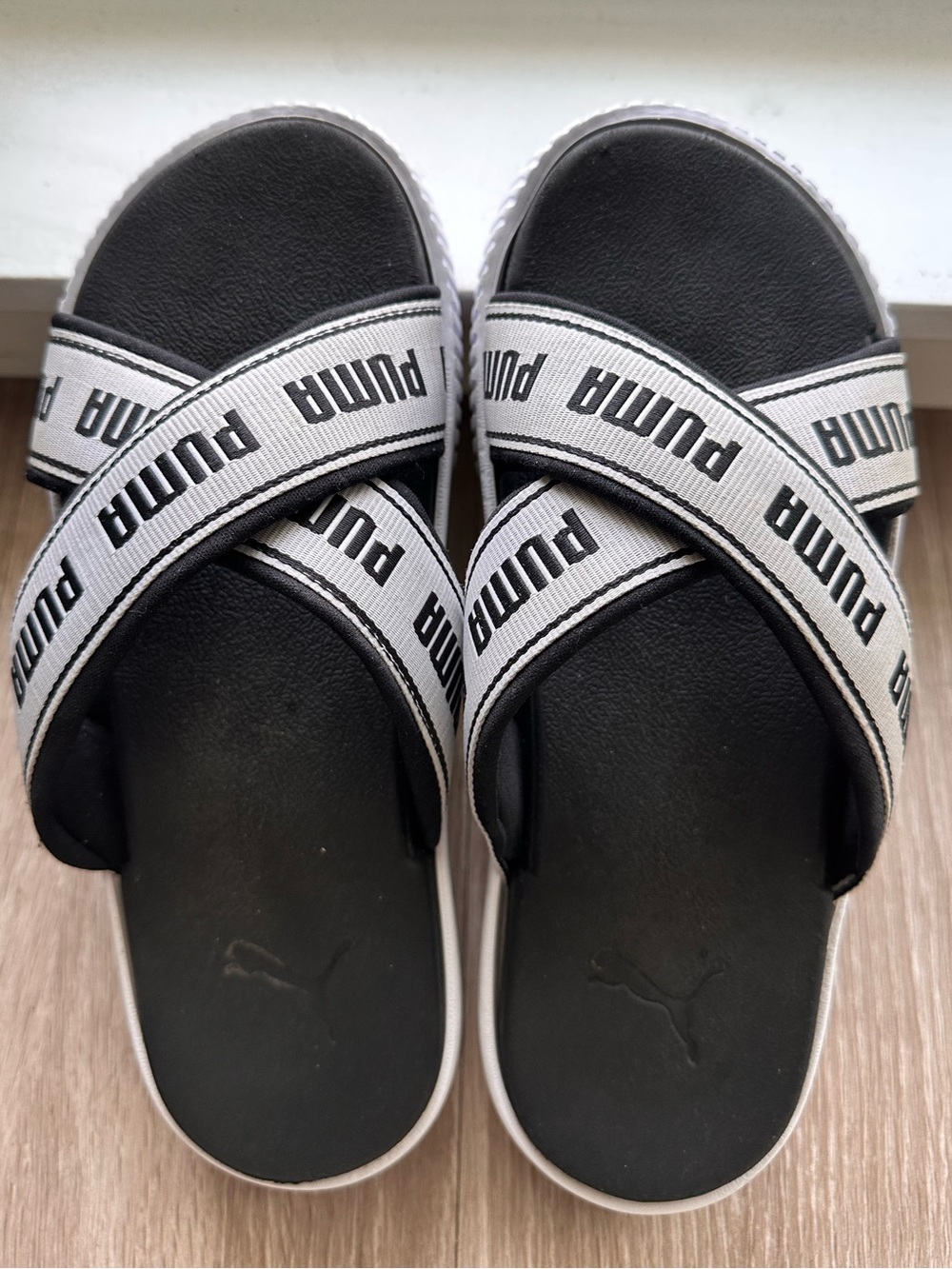 Puma Black Slides with White Logo Cross Straps